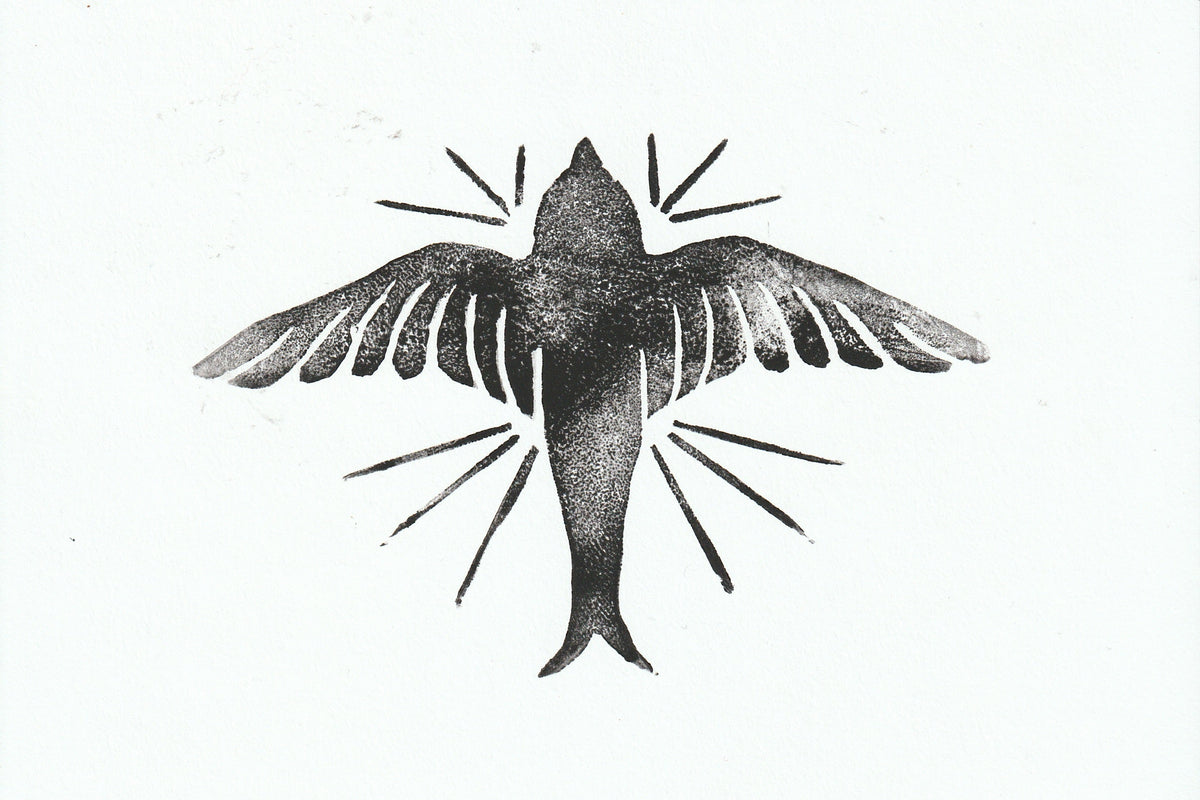 A stamp in black ink on paper of a swallow with outstretched wings, surrounded by decorative spikes